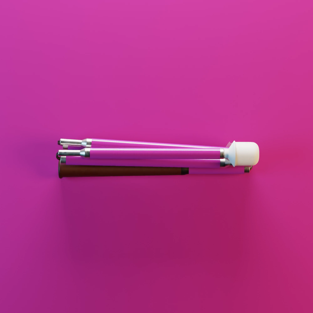 Our pink solid colour mobility cane by With Ease